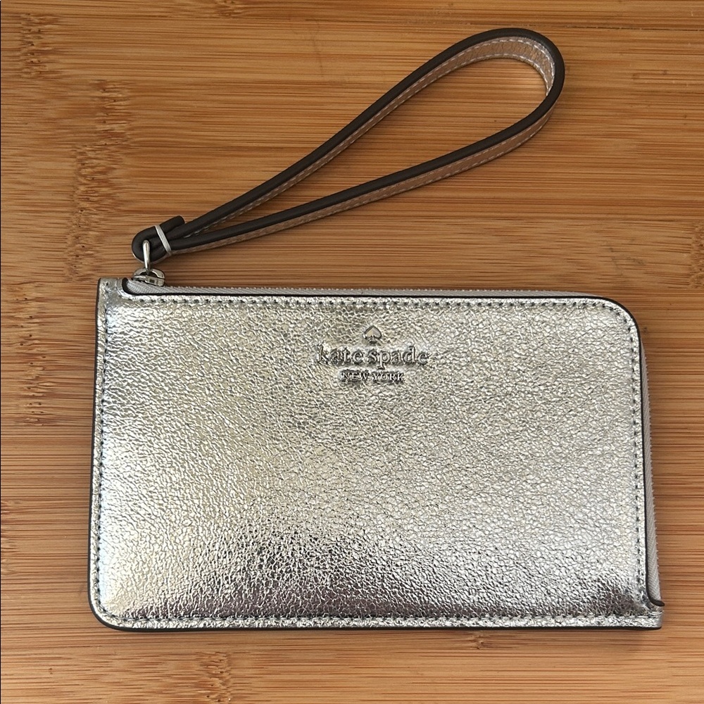 Kate Spade shimmering metallic L-zip silver wristlet, EUC